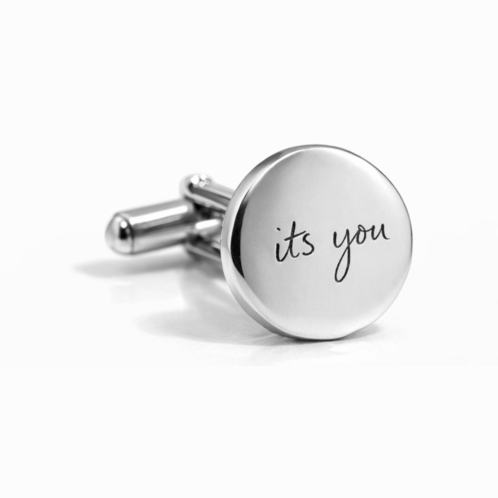 Single close-up detail shot of custom engraved 925 sterling silver round cufflink with personalised handwriting "its you" precision diamond-head engraved on polished silver face – Atelier By Dsgn personalised mens keepsake jewellery gift for wedding day, fathers day or memorial