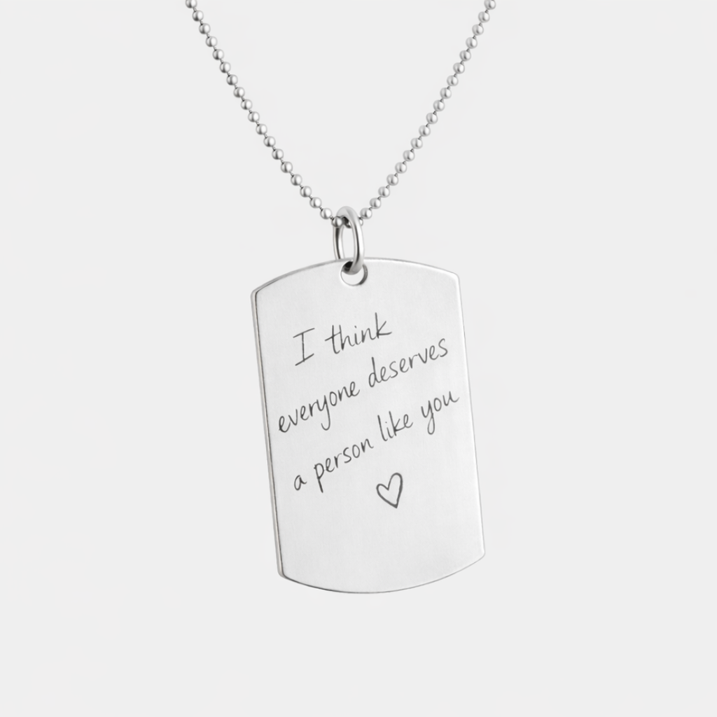 Close-up of custom engraved 925 sterling silver handwriting dog tag necklace on bead chain, featuring personalised handwritten message "I think everyone deserves a person like you" with heart detail – Atelier By Dsgn meaningful personalised jewellery gift