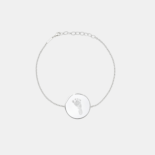 Custom engraved 925 sterling silver adjustable coin bracelet, featuring a personalised single newborn baby footprint with intricate toe and sole detail precision diamond-head engraved on polished round disc on delicate diamond-cut cable chain – Atelier By Dsgn custom footprint coin bracelet meaningful gift for new mum, mothers day, baby shower, new baby arrival or treasured newborn family keepsake bracelet