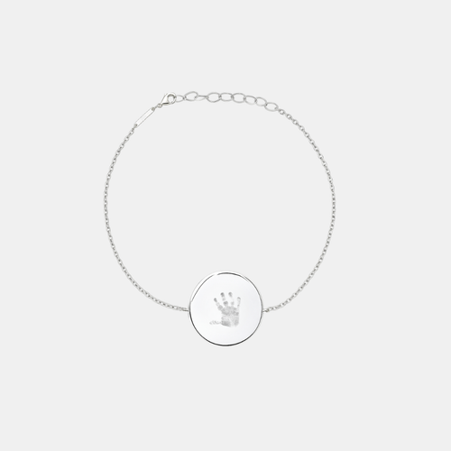Custom engraved 925 sterling silver adjustable coin bracelet, featuring a personalised baby handprint with intricate finger and palm detail precision diamond-head engraved on polished round disc on delicate diamond-cut cable chain – Atelier By Dsgn custom handprint coin bracelet meaningful gift for new mum, mothers day, baby shower, new baby arrival or treasured newborn family keepsake bracelet
