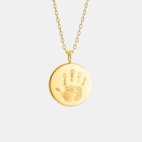 Custom engraved 18k gold vermeil 16mm coin pendant necklace on diamond-cut cable chain, featuring a personalised baby handprint with intricate finger and palm detail precision diamond-head engraved on warm high-polish gold disc – Atelier By Dsgn luxury custom handprint coin necklace meaningful gift for new mum, new dad, mothers day, fathers day, baby shower, new baby arrival or treasured newborn family heirloom necklace