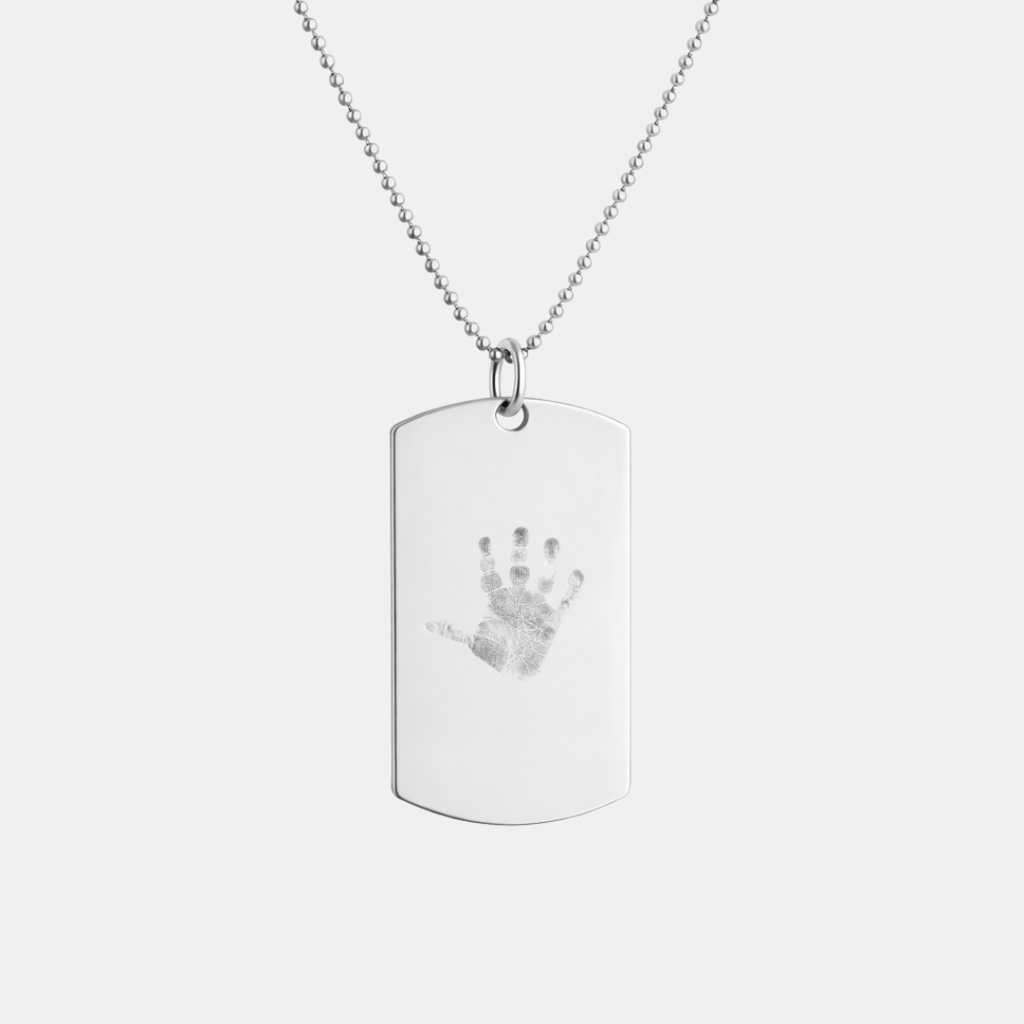 Custom engraved 925 sterling silver unisex dog tag necklace on 61cm bead chain, featuring a personalised baby handprint with intricate finger detail precision diamond-head engraved on polished silver tag – Atelier By Dsgn custom handprint jewellery meaningful gift for new dad, new mum, fathers day, mothers day, new baby arrival, child memorial or treasured family keepsake necklace