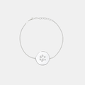 Custom engraved 925 sterling silver adjustable coin bracelet, featuring a personalised pet paw print with intricate toe and pad texture detail precision diamond-head engraved on polished round disc on delicate diamond-cut cable chain – Atelier By Dsgn custom paw print coin bracelet meaningful gift for dog lovers, cat lovers, pet mum, pet dad, pet memorial, rainbow bridge remembrance or new pet adoption keepsake bracelet
