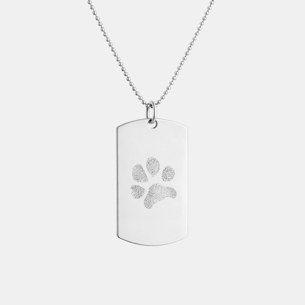Custom engraved 925 sterling silver unisex dog tag necklace on 61cm bead chain, featuring a personalised pet paw print with intricate texture detail precision diamond-head engraved on polished silver tag – Atelier By Dsgn custom paw print jewellery meaningful gift for dog lovers, cat lovers, pet mum, pet dad, pet memorial, rainbow bridge remembrance or gotcha day keepsake necklace