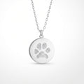 Custom engraved 925 sterling silver 16mm coin pendant necklace on diamond-cut cable chain, featuring a personalised pet paw print with intricate toe and pad texture detail precision diamond-head engraved on polished round disc.  Atelier By Dsgn custom paw print pendant jewellery meaningful gift for dog lovers, cat lovers, pet mum, pet dad, pet memorial, rainbow bridge remembrance or new pet adoption keepsake necklace.  Atelier By DSGN