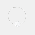 Custom engraved 925 sterling silver adjustable coin bracelet, featuring personalised initial "J" with significant date "22.06.68" precision diamond-head engraved on polished round disc on delicate diamond-cut cable chain – Atelier By Dsgn personalised text coin bracelet meaningful gift for her, birthday milestone, mothers day, anniversary or custom initial date and name keepsake bracelet