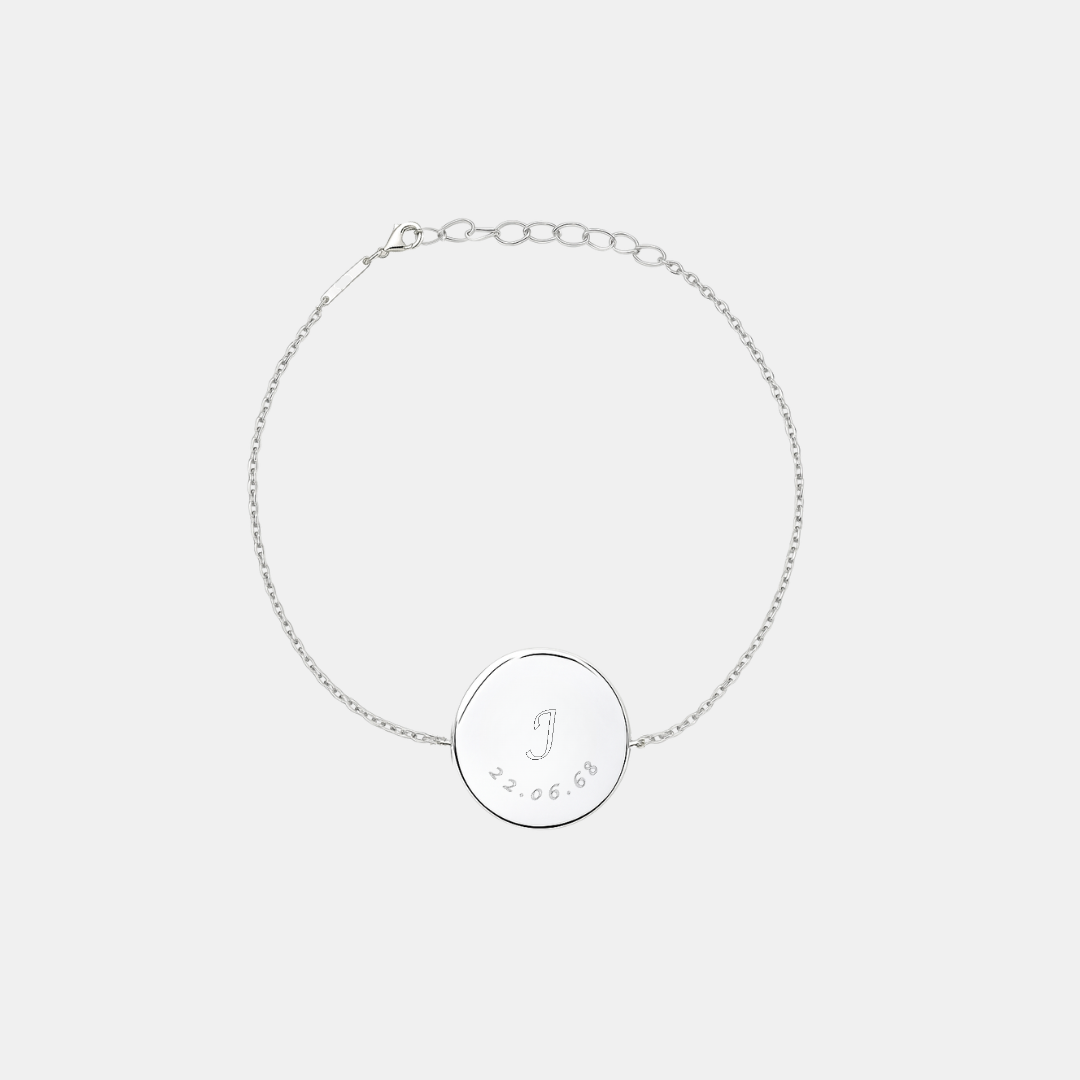 Custom engraved 925 sterling silver adjustable coin bracelet, featuring personalised initial "J" with significant date "22.06.68" precision diamond-head engraved on polished round disc on delicate diamond-cut cable chain – Atelier By Dsgn personalised text coin bracelet meaningful gift for her, birthday milestone, mothers day, anniversary or custom initial date and name keepsake bracelet