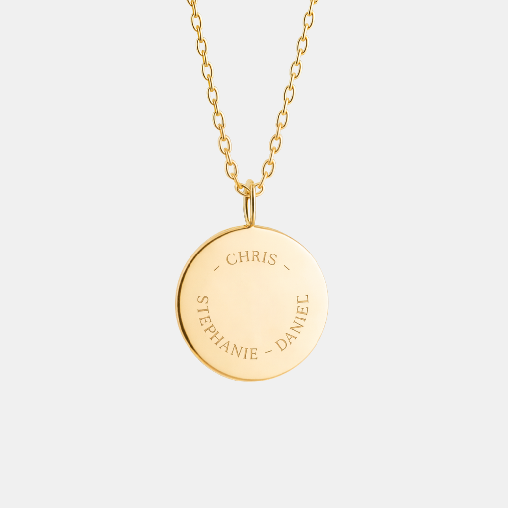 Custom engraved 18k gold vermeil 16mm coin pendant necklace on diamond-cut cable chain, featuring personalised family names "Chris, Stephanie, Daniel" precision diamond-head engraved in elegant curved layout on warm high-polish gold disc – Atelier By Dsgn personalised text coin necklace luxury gift for her, mothers day, family keepsake, anniversary, birthday or custom names and initials heirloom necklace