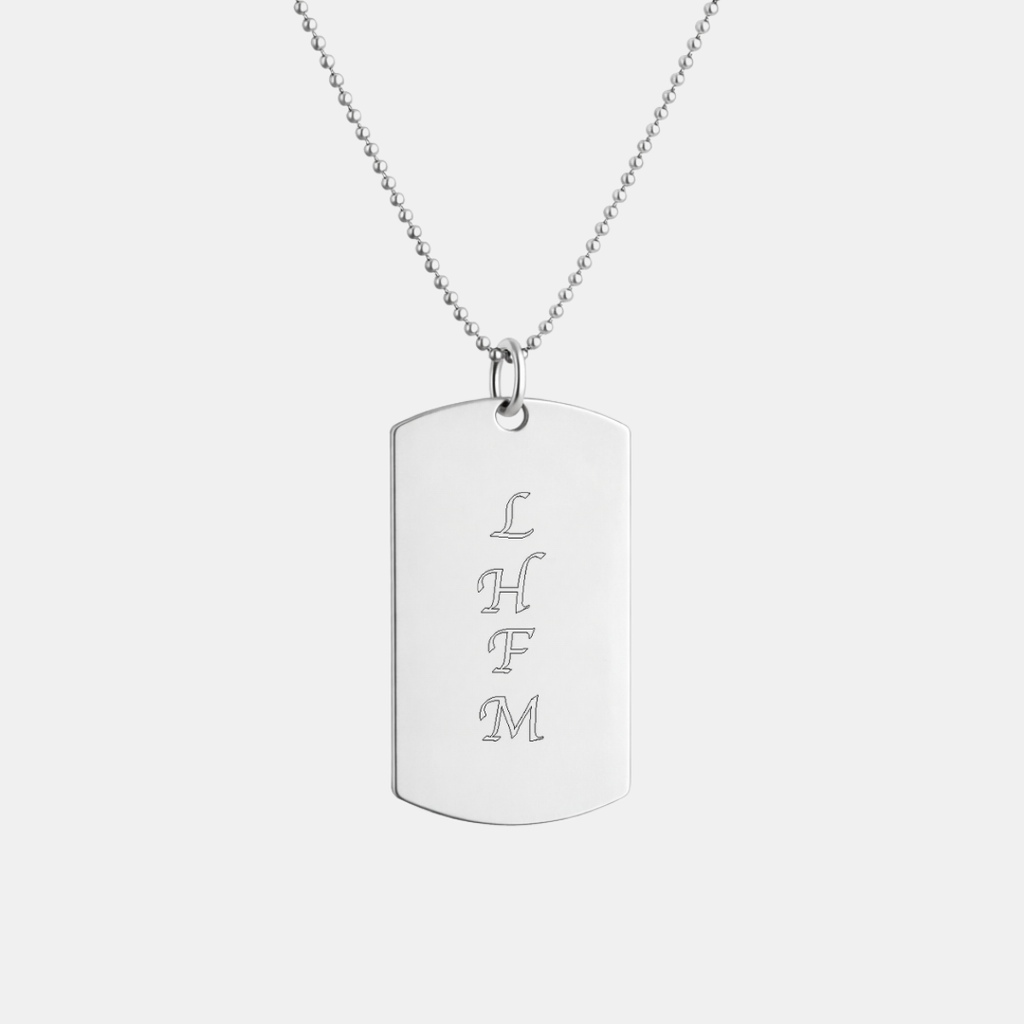 Custom engraved 925 sterling silver unisex dog tag necklace on 61cm bead chain, featuring personalised stacked family initials "L, H, F, M" precision diamond-head engraved in elegant vertical layout on polished silver tag – Atelier By Dsgn personalised initials dog tag necklace meaningful gift for fathers day, new dad, family keepsake, anniversary, birthday or custom name and initials memorial necklace