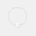 Custom engraved 925 sterling silver adjustable coin bracelet, featuring a personalised single-line minimalist mother and baby portrait precision diamond-head engraved on polished round disc on delicate diamond-cut cable chain – Atelier By Dsgn custom line art portrait coin bracelet meaningful gift for new mum, mothers day, baby shower, birth keepsake or cherished family heirloom bracelet