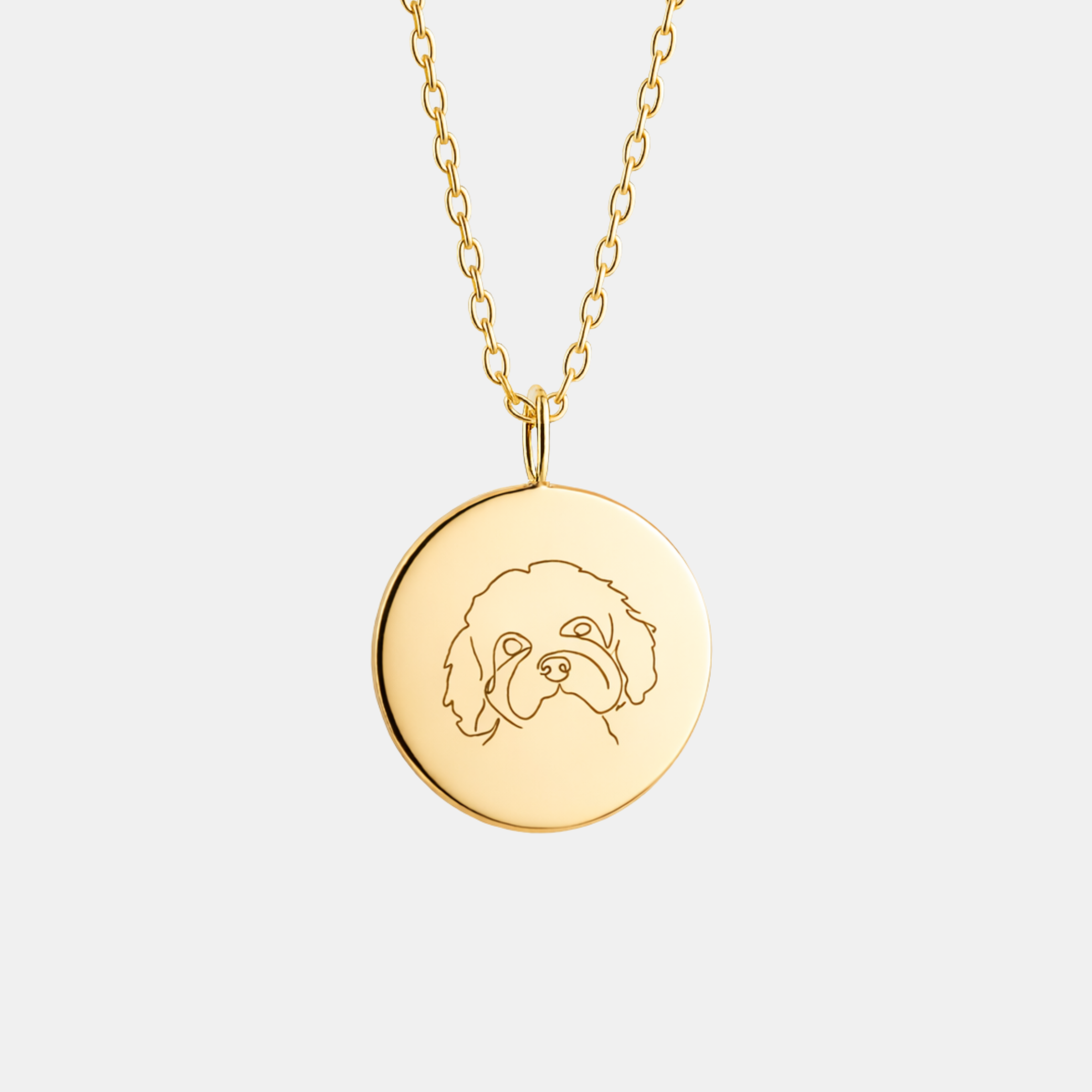 Custom engraved 18k gold vermeil 16mm coin pendant necklace on diamond-cut cable chain, featuring a personalised single-line minimalist Cavalier King Charles Spaniel face portrait precision diamond-head engraved on warm high-polish gold disc – Atelier By Dsgn luxury custom pet portrait jewellery gift for dog lovers, Cavalier Spaniel mum, dog dad, pet memorial, rainbow bridge remembrance or new puppy celebration keepsake necklace