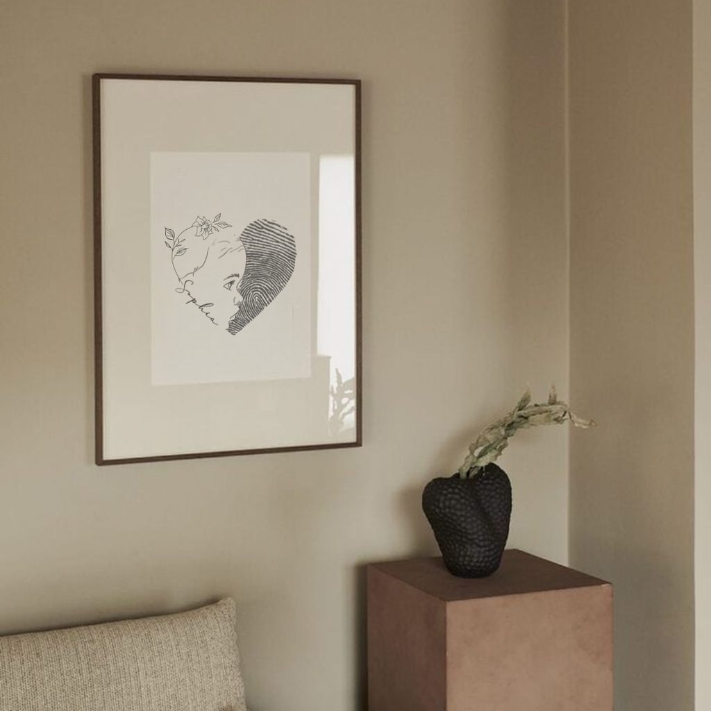 Custom single line drawing with fingerprint artwork personalised with name "Sophia" displayed as framed wall art in minimal neutral interior living space, Atelier By Dsgn personalised fingerprint portrait digital art printed and framed as stunning personalised home décor, wall art or meaningful memorial keepsake gift