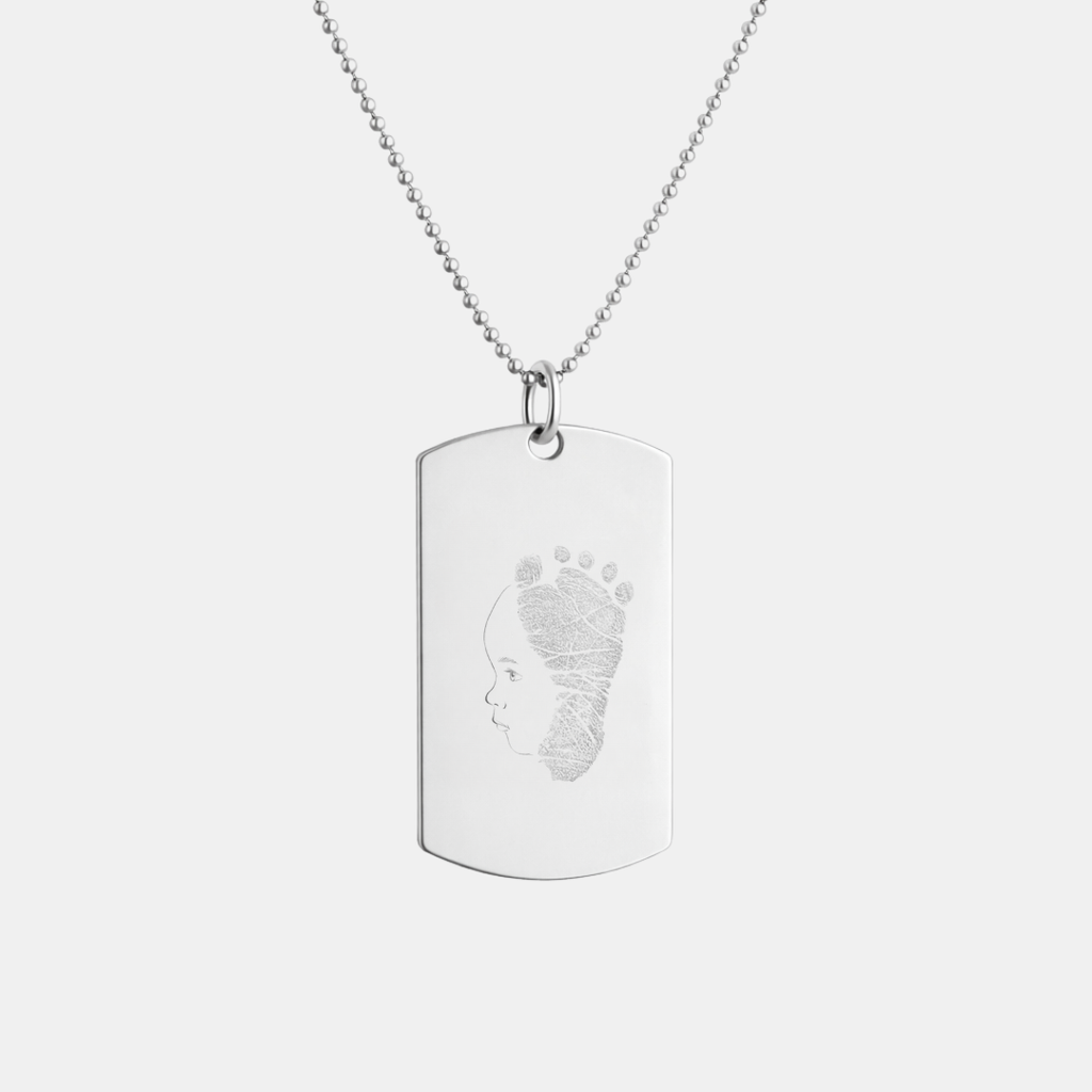 Custom engraved 925 sterling silver dog tag necklace on 61cm bead chain, featuring a personalised single-line minimalist baby side profile portrait uniquely combined with actual baby footprint texture precision diamond-head engraved on polished silver tag – Atelier By Dsgn custom fingerprint footprint jewellery deeply personal gift for new dad, new mum, fathers day, mothers day, birth keepsake or cherished newborn memorial heirloom necklace
