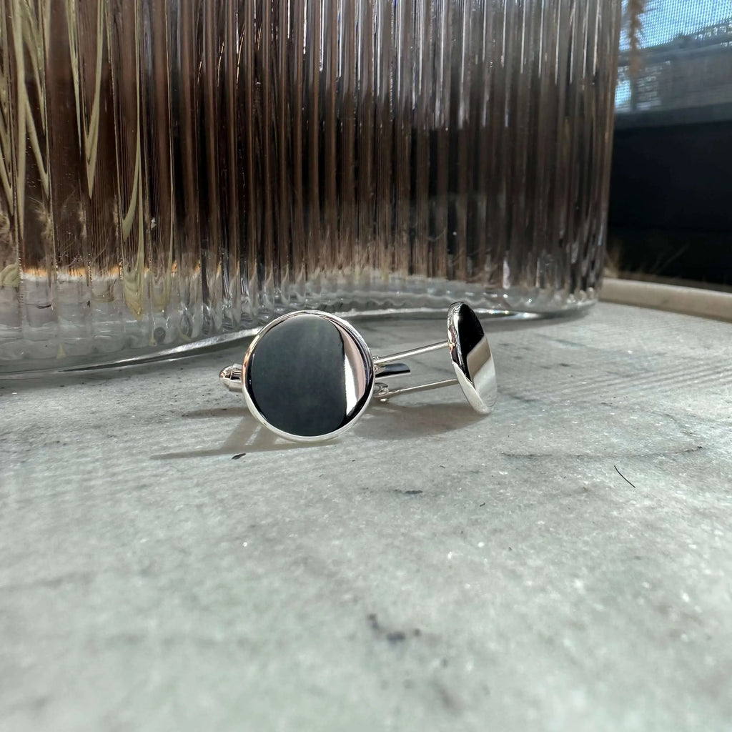 Engraved 925 sterling silver cufflinks by Atelier, showcasing a polished, blank front view design.