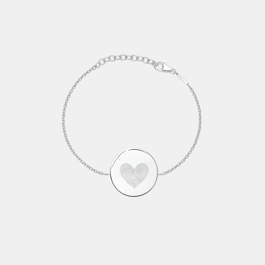 Heart fingerprint coin bracelet in 925 sterling silver, featuring a delicate design and textured coin detail.