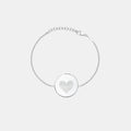Heart fingerprint coin bracelet in 925 sterling silver, featuring a delicate design and textured coin detail.