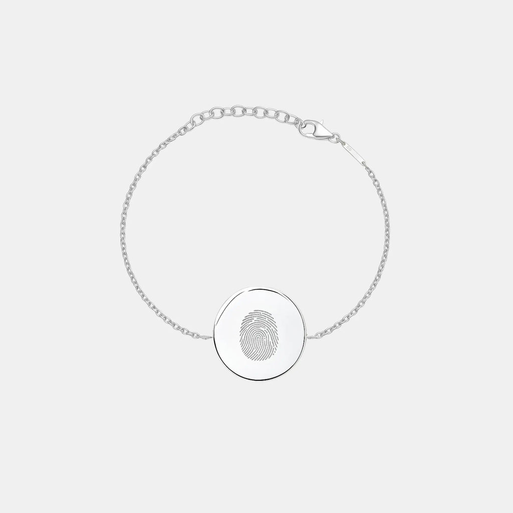 Single fingerprint coin bracelet in 925 sterling silver by Atelier By DSGN showcasing a detailed fingerprint design.