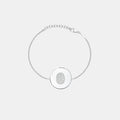 Single fingerprint coin bracelet in 925 sterling silver by Atelier By DSGN showcasing a detailed fingerprint design.