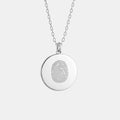 The Atelier By DSGN Single Fingerprint Pendant Necklace in 925 Sterling Silver — a minimalist round coin pendant featuring a finely engraved fingerprint design, symbolising love, memory, and personal connection in elegant handcrafted jewelry.