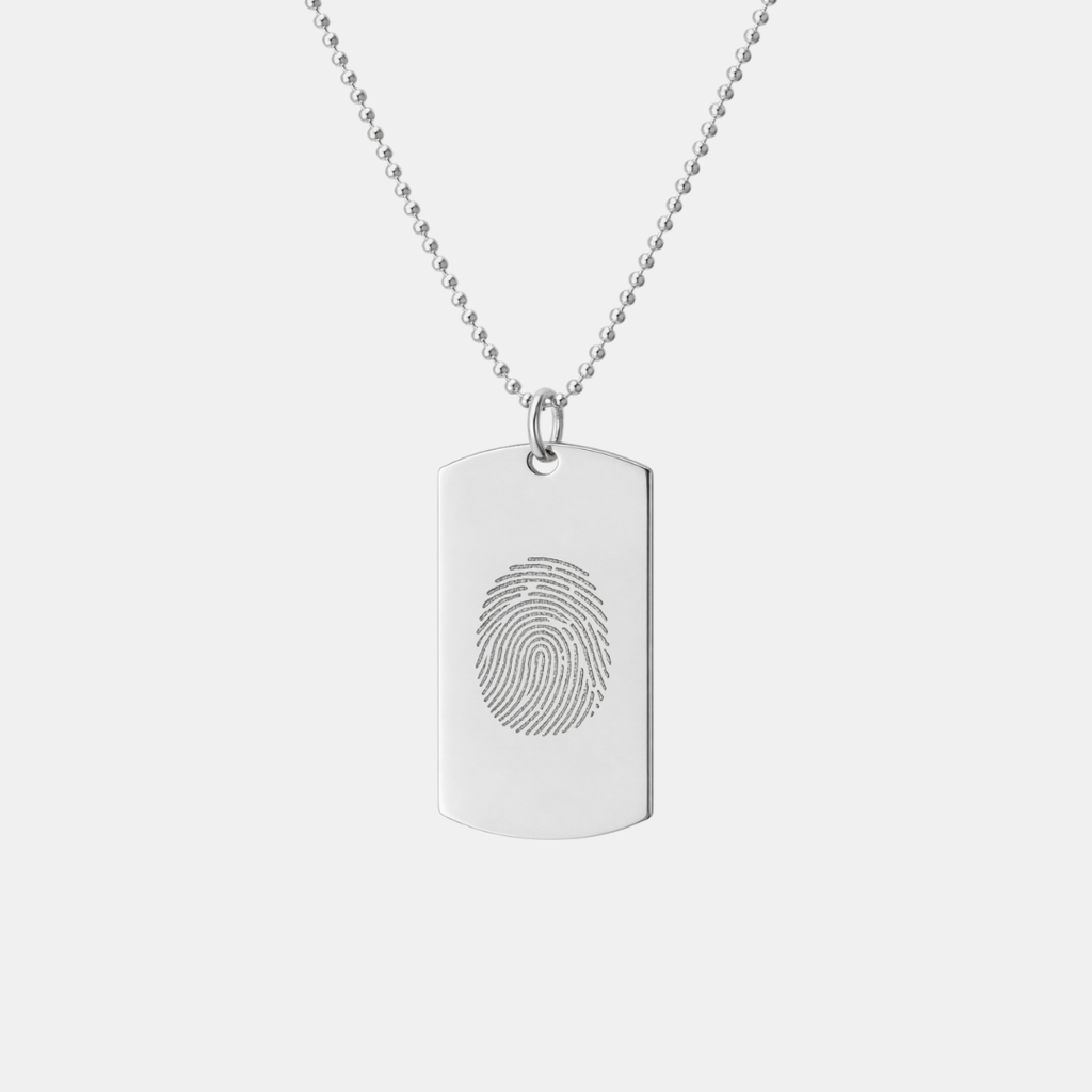 Atelier 925 sterling silver dog tag pendant with custom diamond-engraved single fingerprint design, displayed hanging on adjustable bead chain