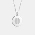 Atelier Two Fingerprint Pendant Necklace in 925 Sterling Silver — a handcrafted keepsake featuring two diamond-engraved fingerprints on a polished 16mm coin pendant, symbolising connection, love, and timeless craftsmanship.