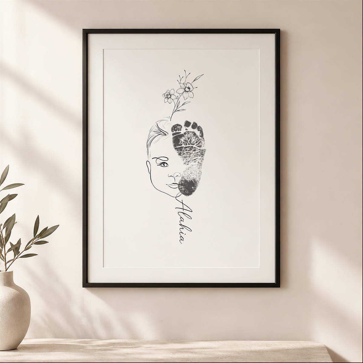 Custom single line drawing baby portrait fused with real baby footprint and delicate floral detail, personalised with name "Alexia" in a black frame and displayed on a wall in a minimalist setting.  Atelier By Dsgn single line drawing with footprint artwork, personalised baby keepsake digital art perfect for nursery wall art, memory book or meaningful new baby gift