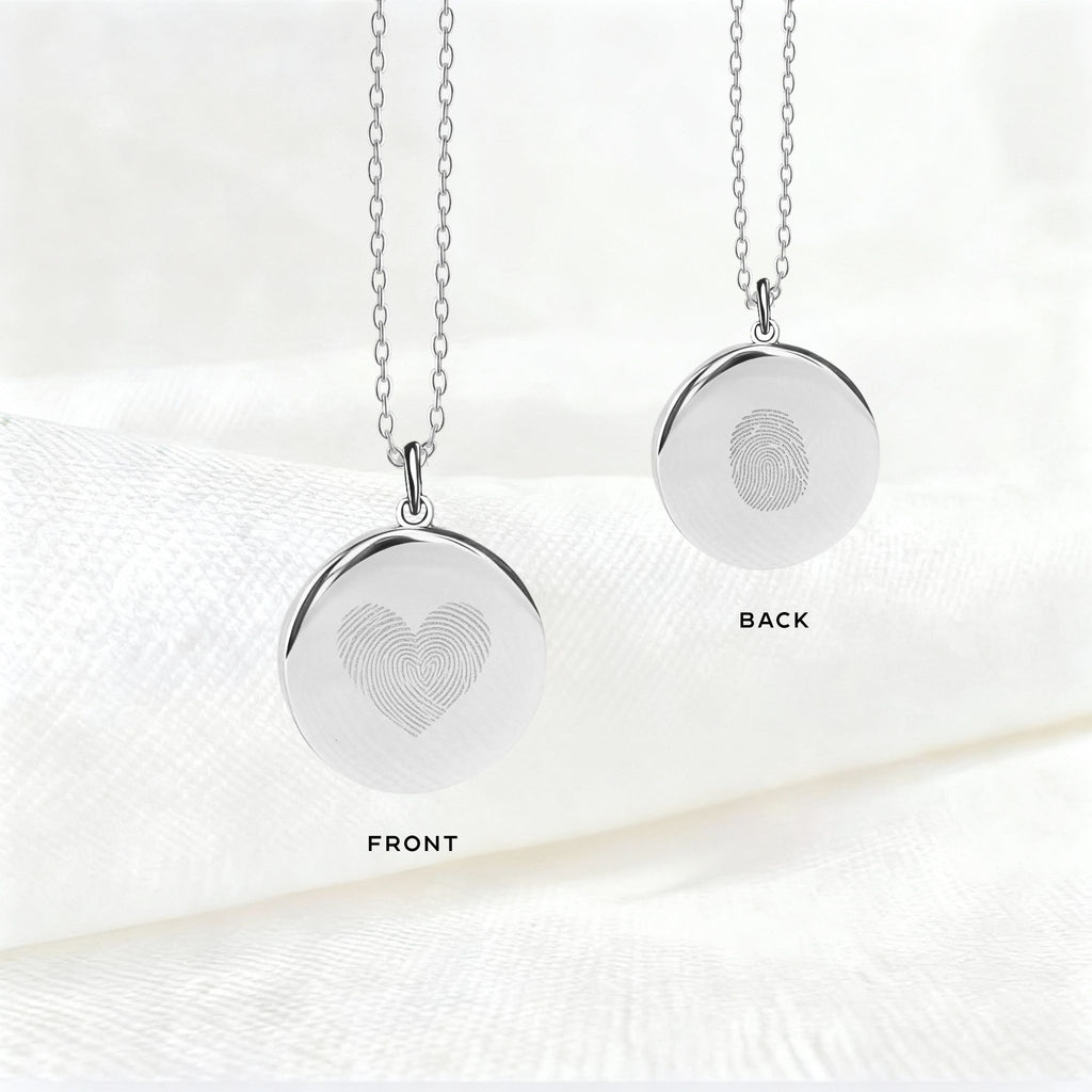 Heart Fingerprint Necklace in 925 Sterling Silver showing front and back views -featuring a heart-shaped dual fingerprint engraving on the front and a single fingerprint detail on the back for a personal, timeless keepsake.