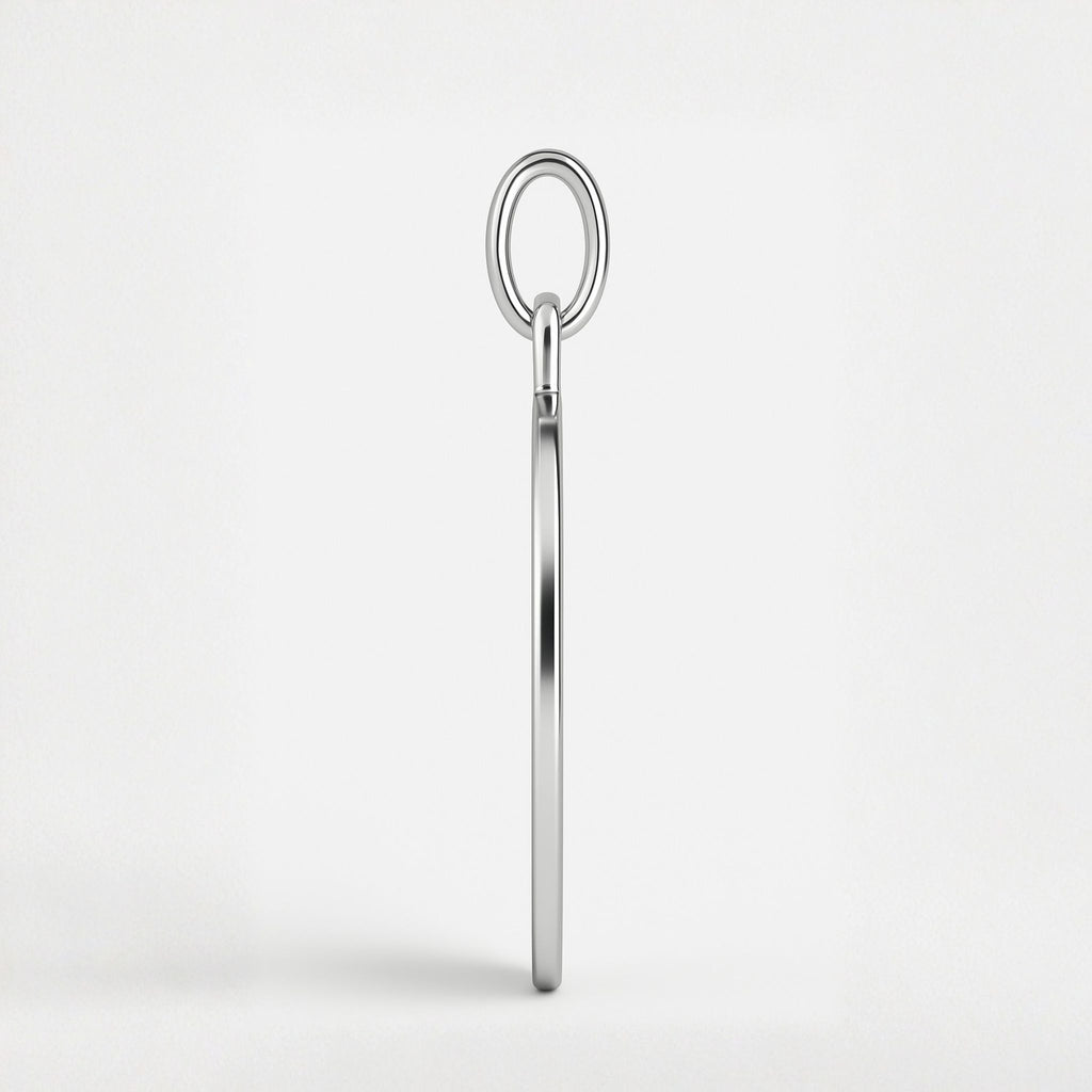 Side view of Atelier Heart Fingerprint Pendant Necklace in 925 Sterling Silver showing the pendant’s refined 1.5mm depth and sleek polished edge, crafted for durability and timeless elegance.