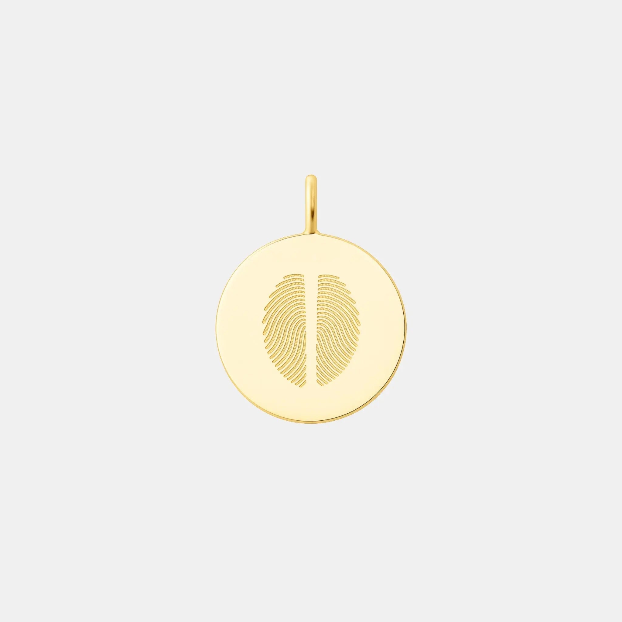 Minimalist two fingerprint pendant crafted in 18K gold vermeil by Atelier By DSGN. Features dual engraved fingerprints on a polished circular disc, an elegant, meaningful keepsake symbolizing love, unity, and connection. Perfect for luxury personalized jewelry collections.