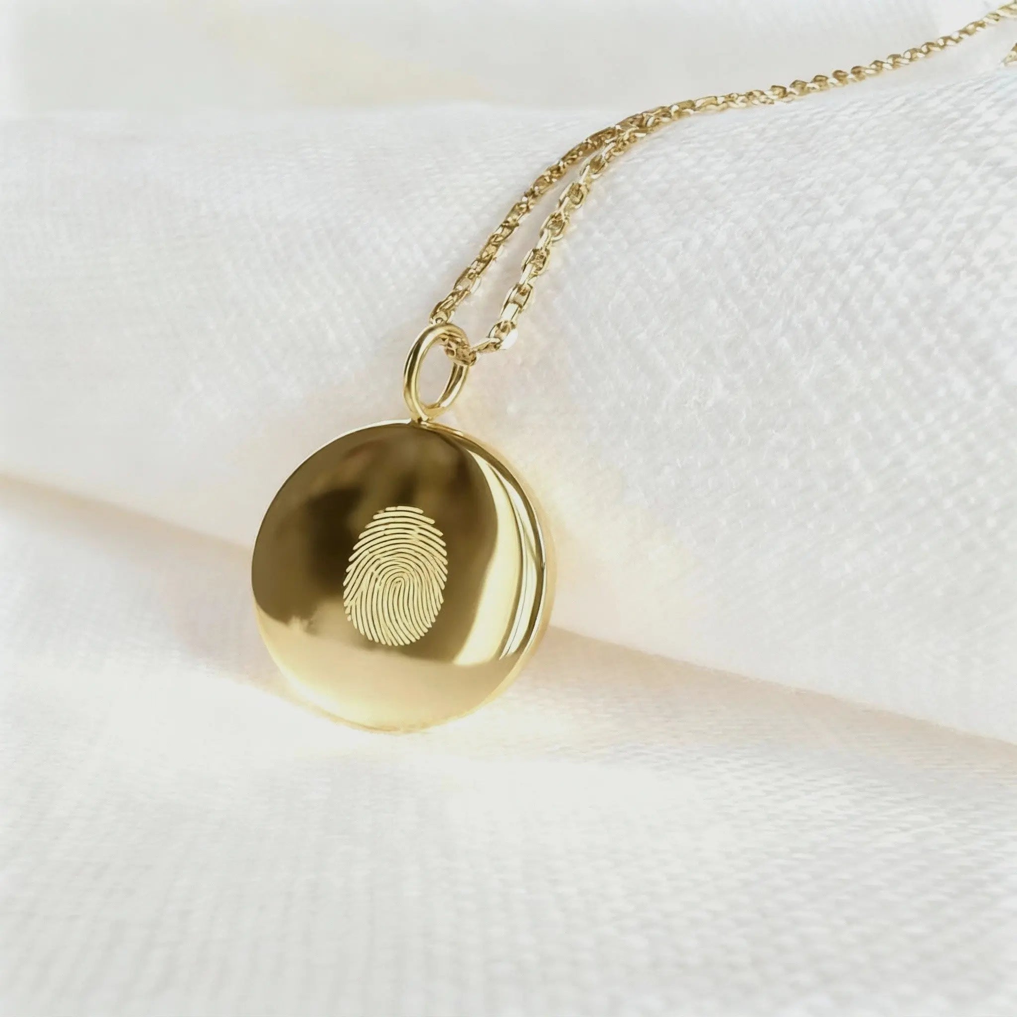 18k gold vermeil single fingerprint coin necklace by Atelier By DSGN , showcasing a personalized keepsake design.