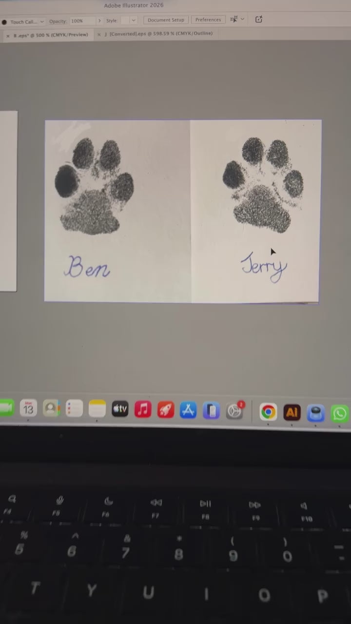 Short video of two pawprint engraved cufflinks with paw prints of two much loved dogs.  