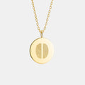Two Fingerprint Coin Necklace in 18k Gold Vermeil by Atelier By DSGN luxury custom jewelry featuring dual engraved fingerprints on a polished round gold pendant.