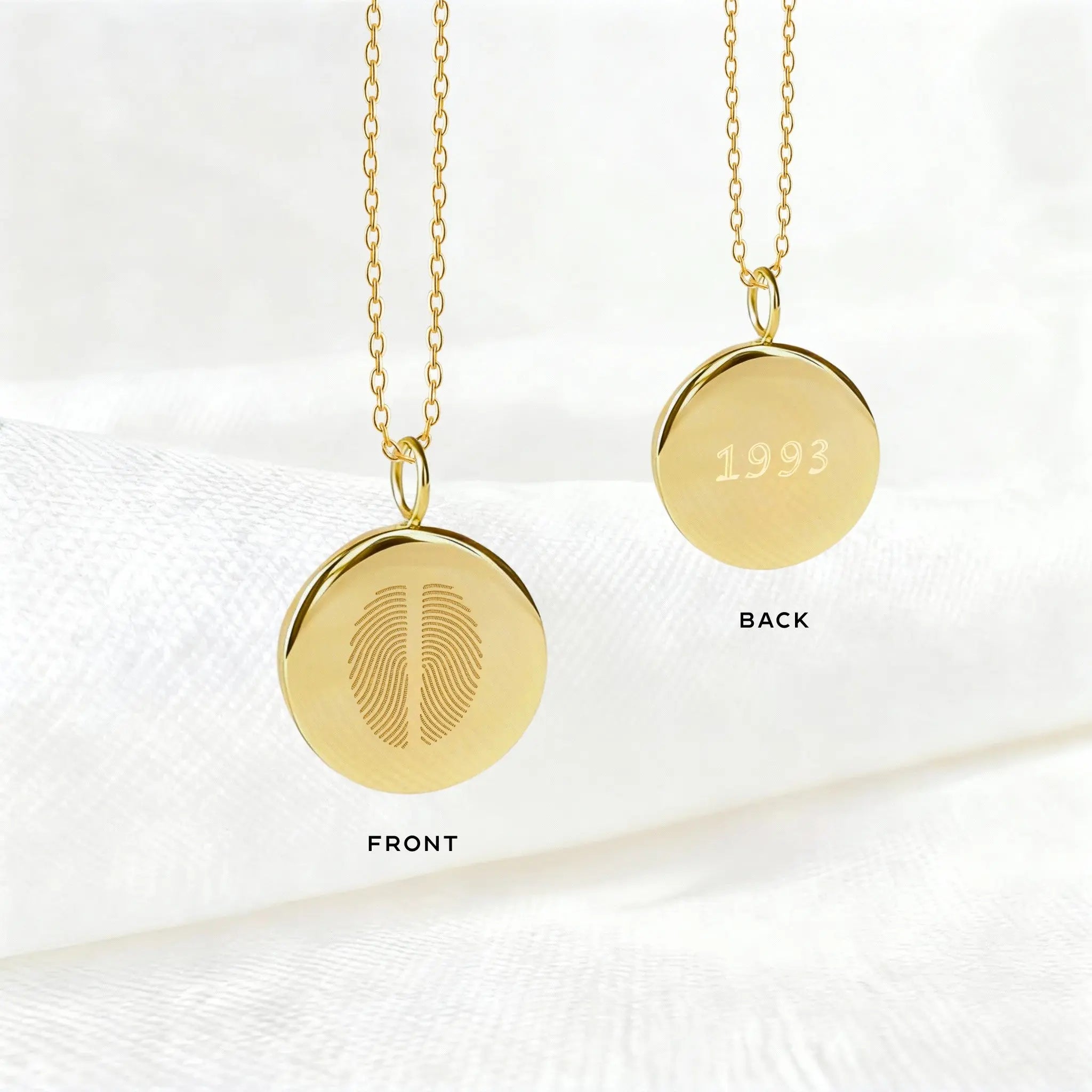 Two Fingerprint Pendant Necklace in 18K gold vermeil by Atelier By DSGN, showing front and back engraving. Front features dual engraved fingerprints, while the back is customizable with names, initials, or meaningful dates — a luxury double-sided keepsake handcrafted for timeless personalization.